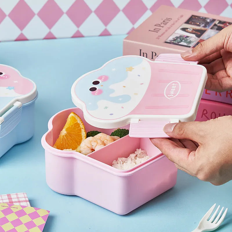 Pink and blue creative ice cream shaped plastic lunch box with bento compartments and included spoon and fork.