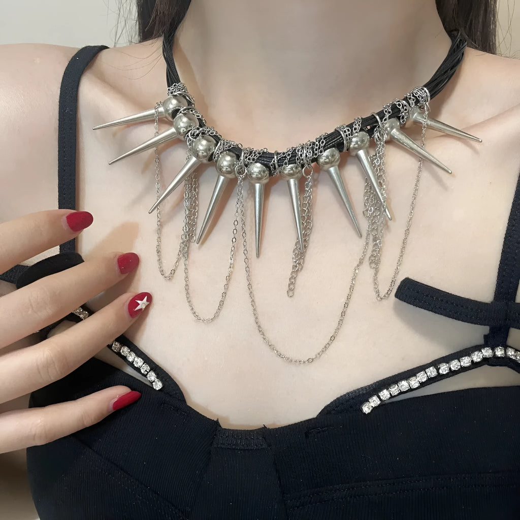 Women's leather tassel necklace with round beads and rivet detailing in electroplated finish