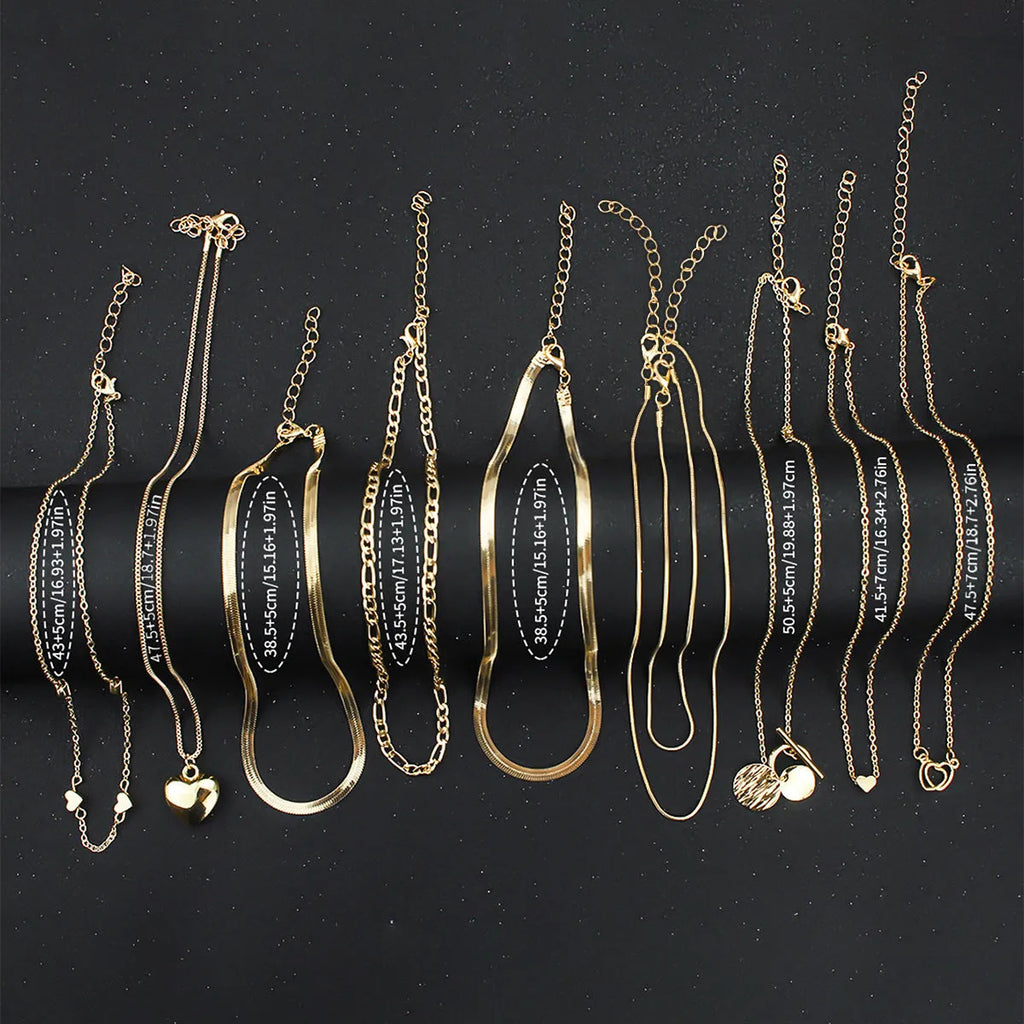 Women's 10 piece necklace set with gold electroplated finish and snake bone chain design