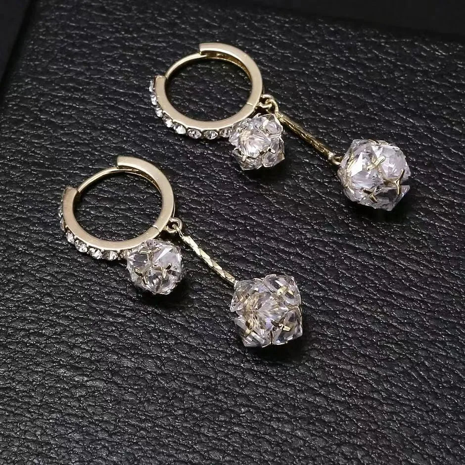 Silver confession balloon tassel ball earrings with rhinestone detailing on copper drop earrings