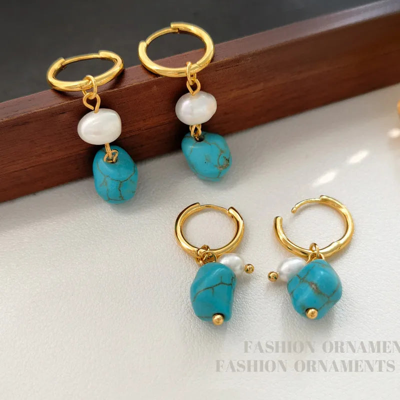 A pair of geometric copper ear clips with irregular turquoise cultured pearls, shown in short and long style options.