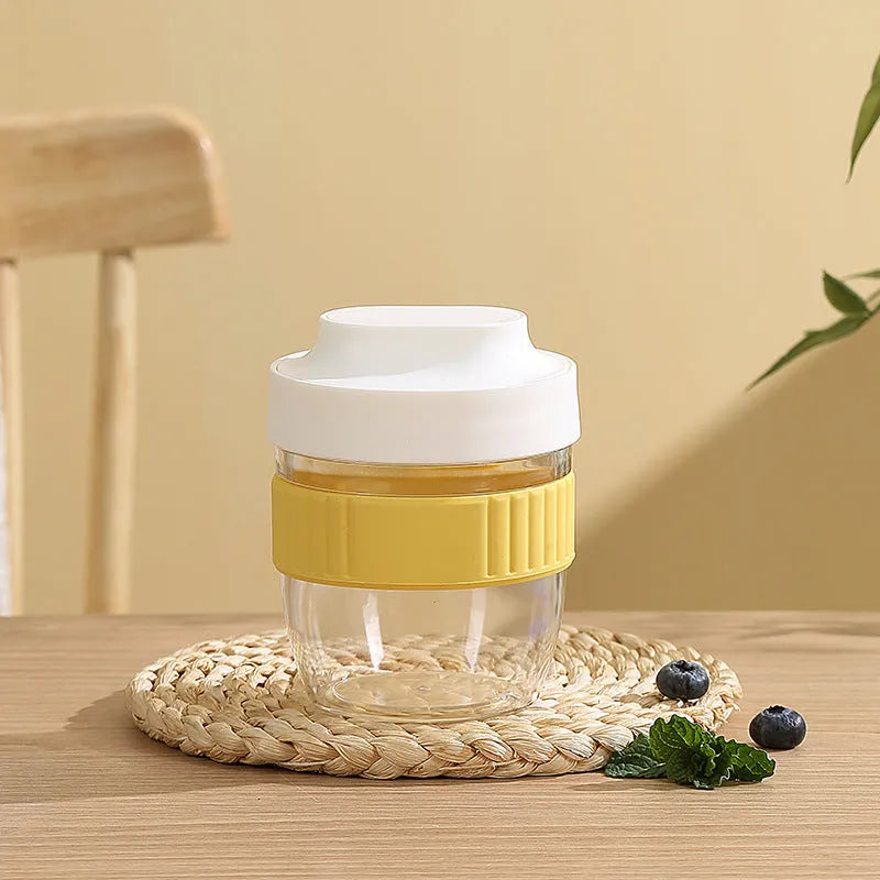 Green PP plastic salad cup with integrated lid and spoon showing 480ml capacity measurement