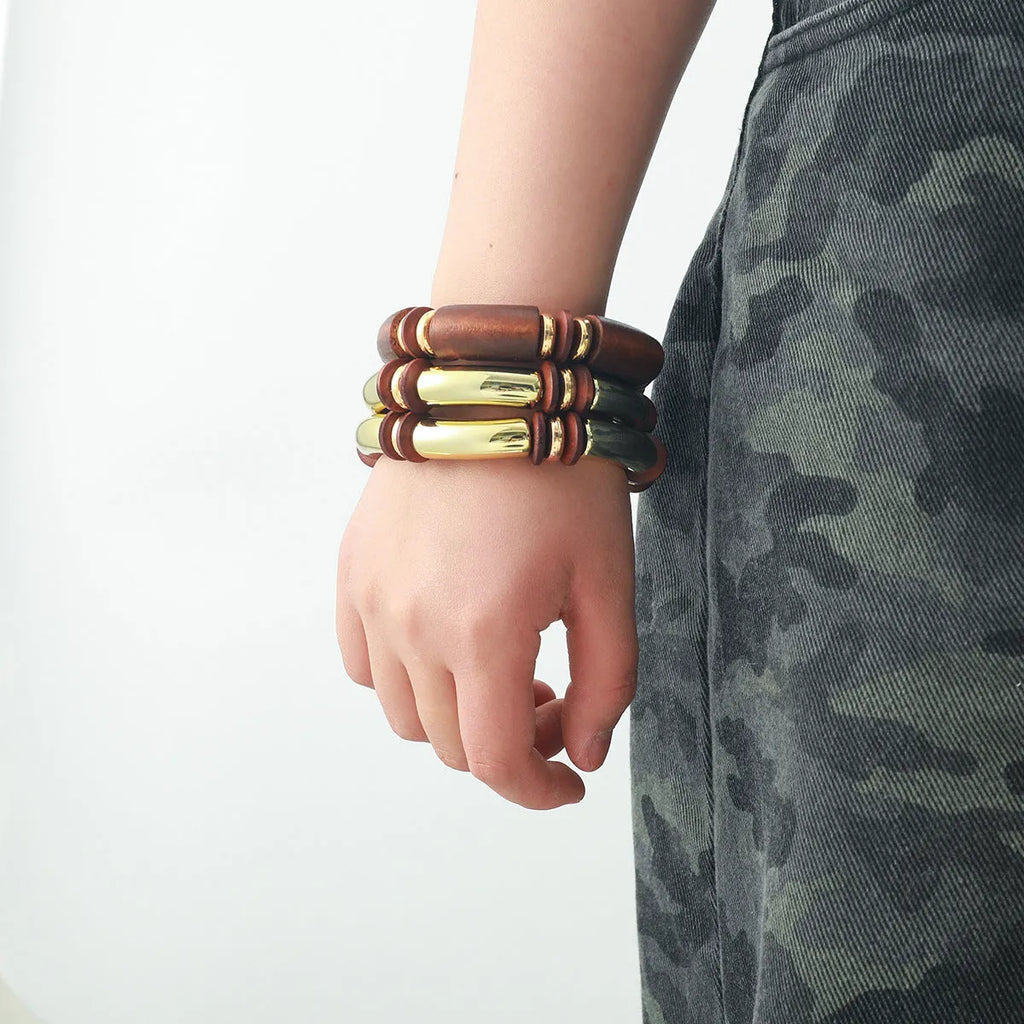 Women's exaggerated multi-layer necklace and bracelet set in alloy with round pendant elements