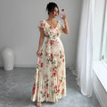Apricot-coloured women's V-neck dress with a digital floral print, ruffled short sleeves, and a flowing oversized swing skirt.