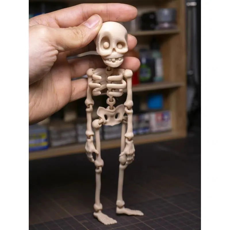 3D printed white skull refrigerator magnet ornament measuring 18cm high