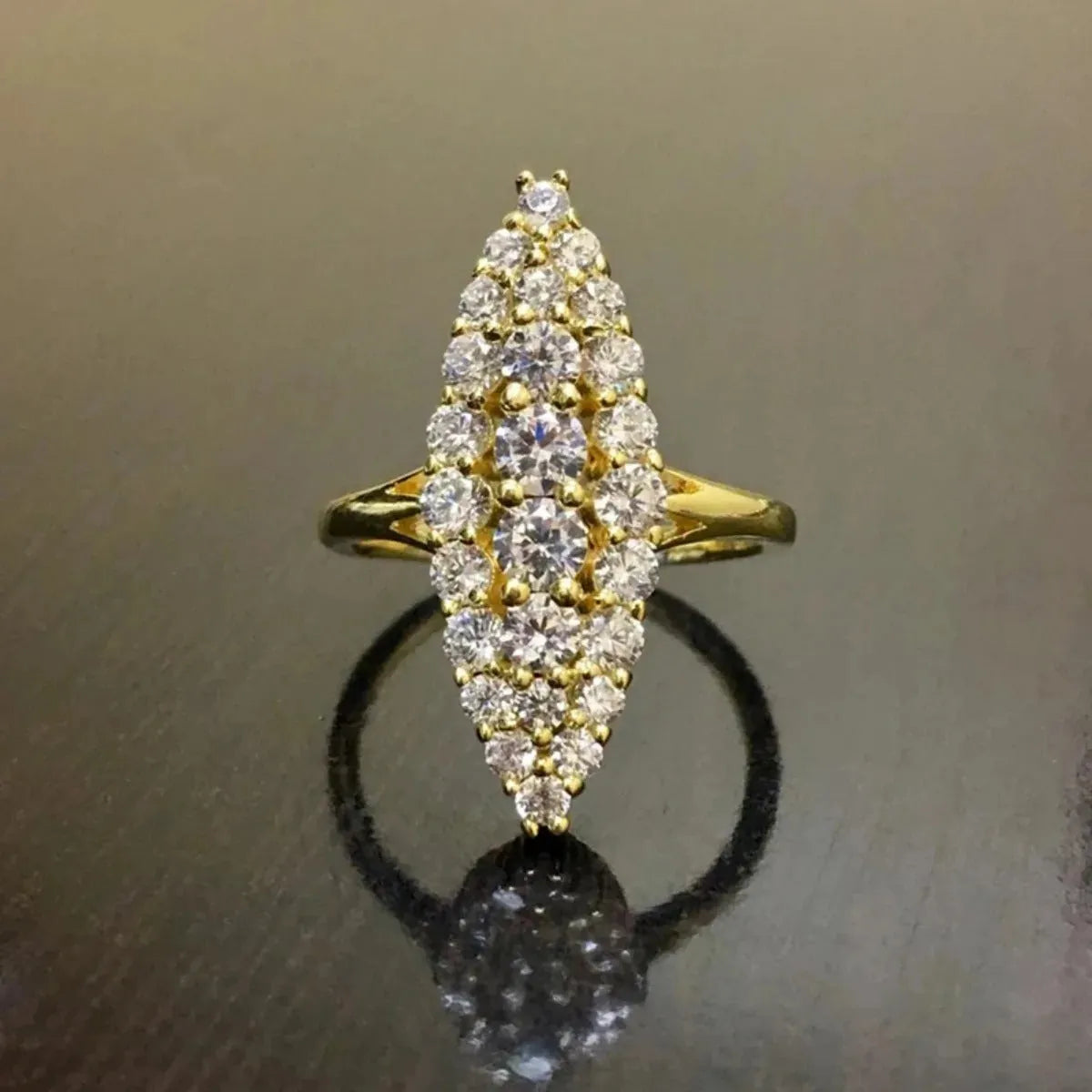 Gold electroplated copper women's ring with geometric full diamond design, sizes 5 to 11