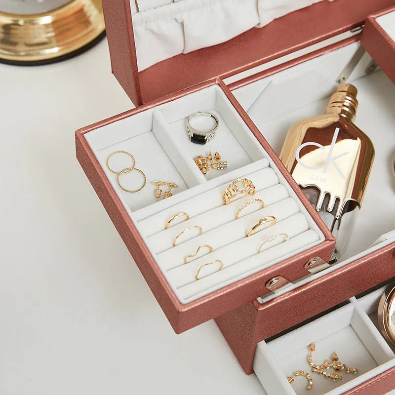 PU leather jewellery storage box in beige, black, pink, and rose gold colours measuring 22.5cm x 15.5cm x 14cm