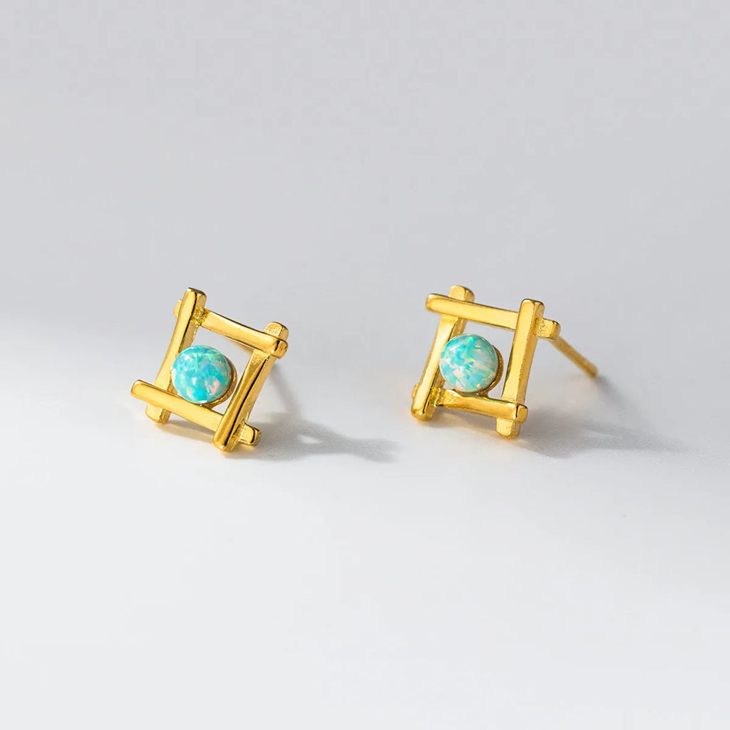 Women's geometric cross shaped stud earrings in 925 sterling silver with a choice of gold or silver finish.
