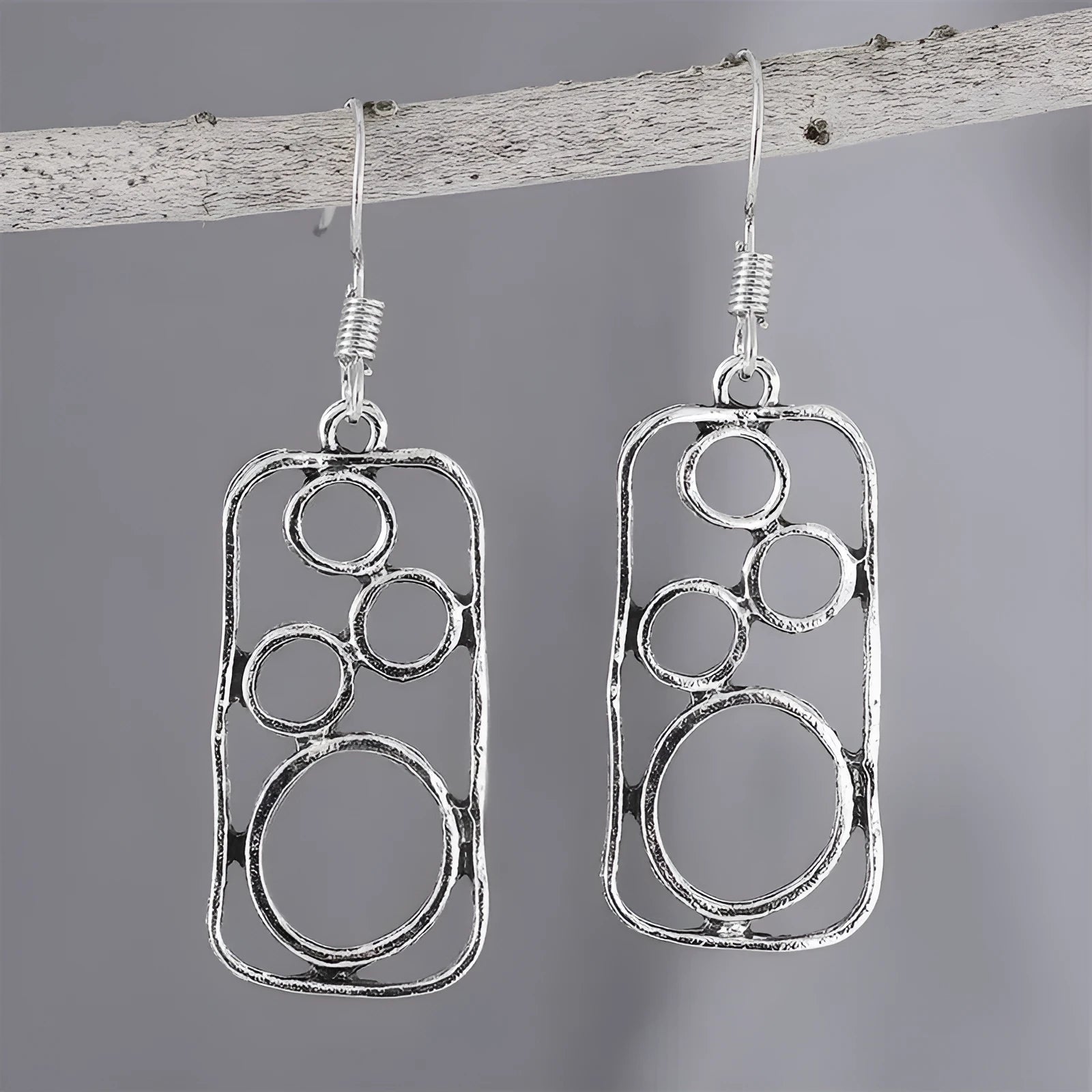 Geometric square earrings with round ring detailing in antique silver colour