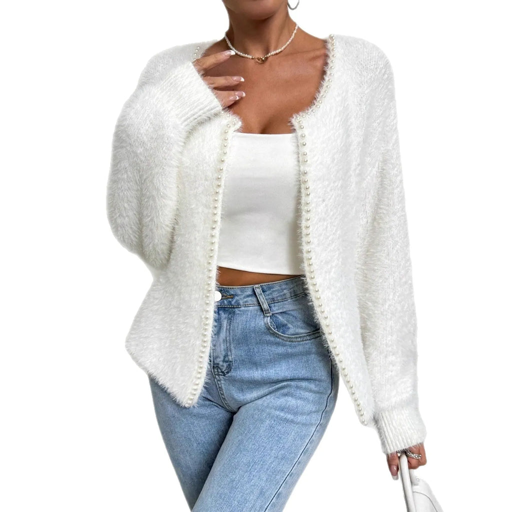 White women's V-neck cardigan with bead knit detail on medium thickness polyester fabric