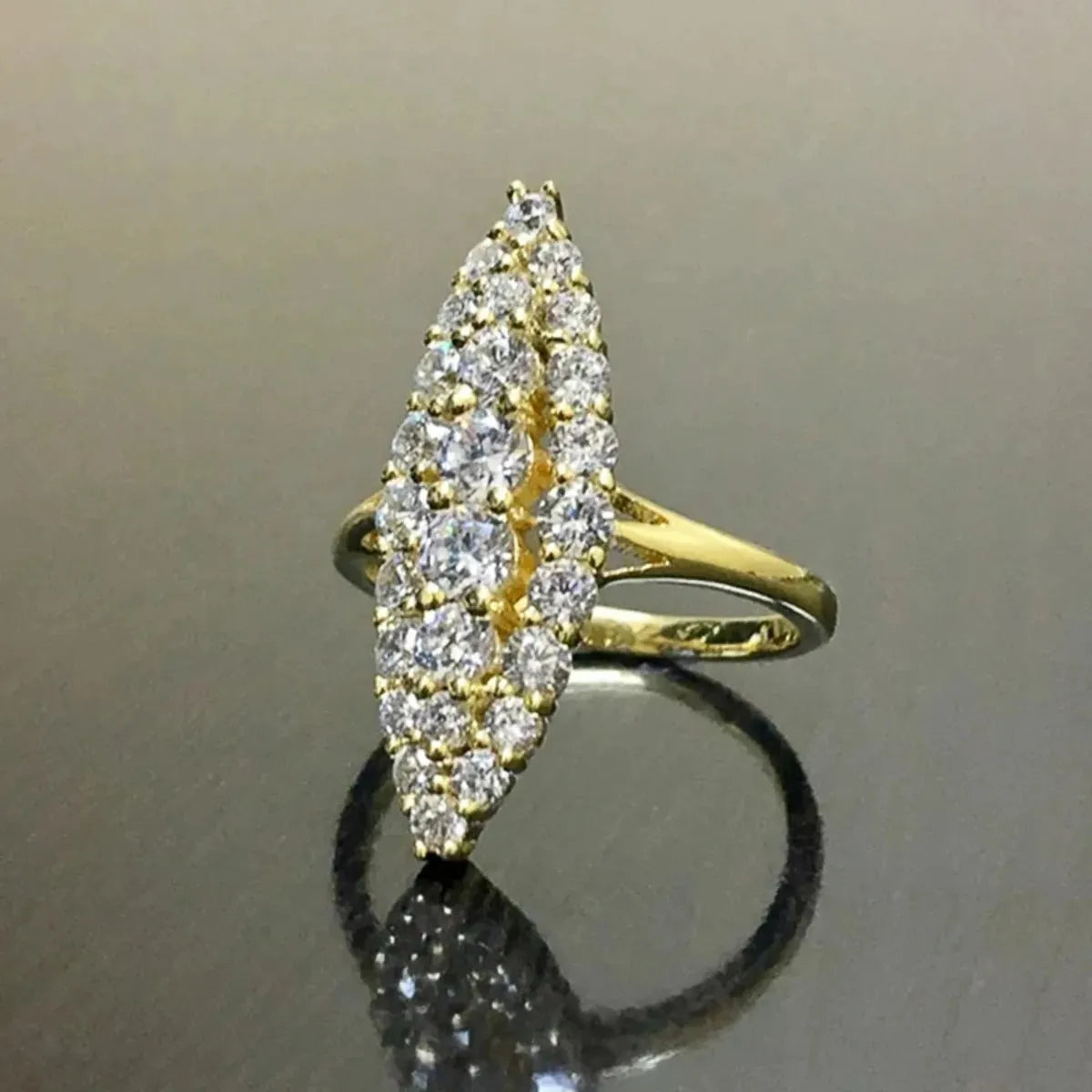 Gold electroplated copper women's ring with geometric full diamond design, sizes 5 to 11
