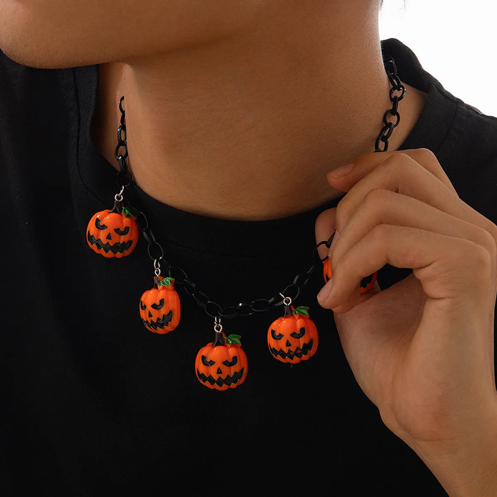 Mixed colour Halloween ghost pumpkin cartoon pendant necklace on a regular chain.