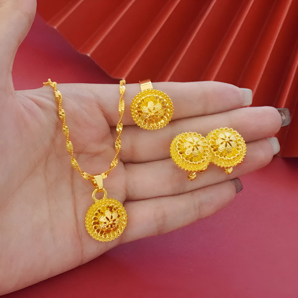 Gold electroplated floral design three-piece jewellery set showing necklace, earrings, and ring on water wave chain.