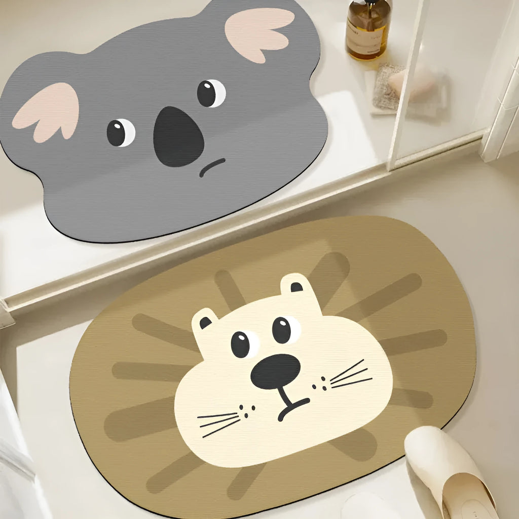 Thickened diatom ooze absorbent bathroom mat with cartoon animal design on a bathroom floor.