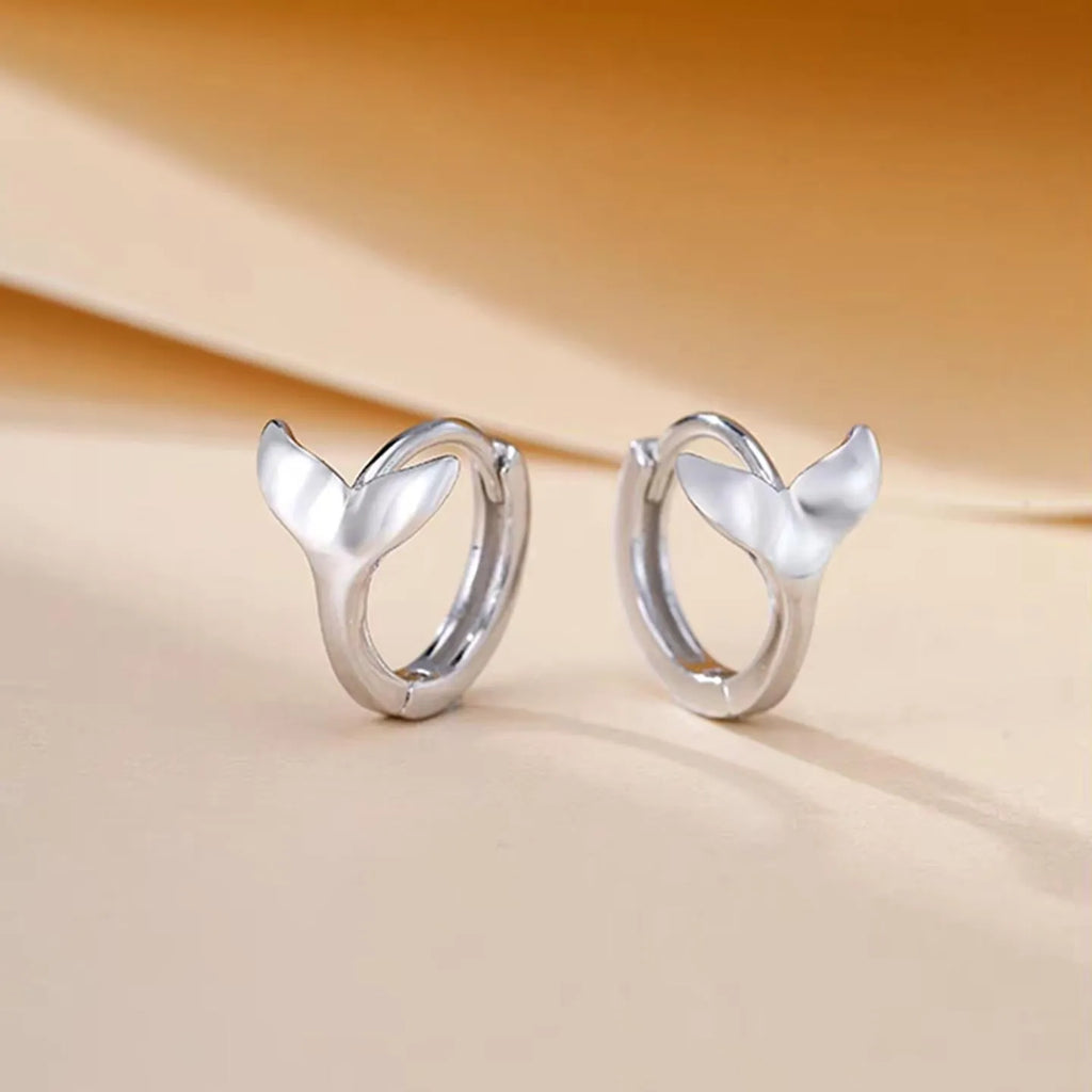 A pair of women's simple fishtail design earrings with an electroplated finish in a choice of colours.