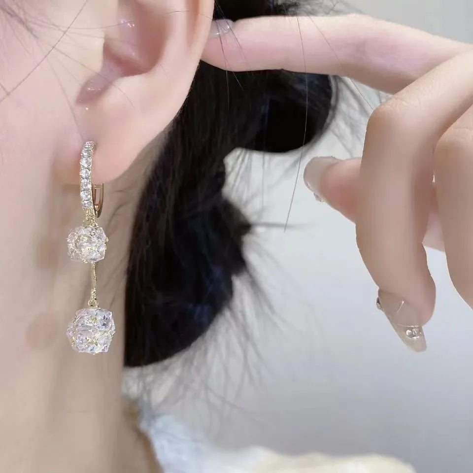 Silver confession balloon tassel ball earrings with rhinestone detailing on copper drop earrings