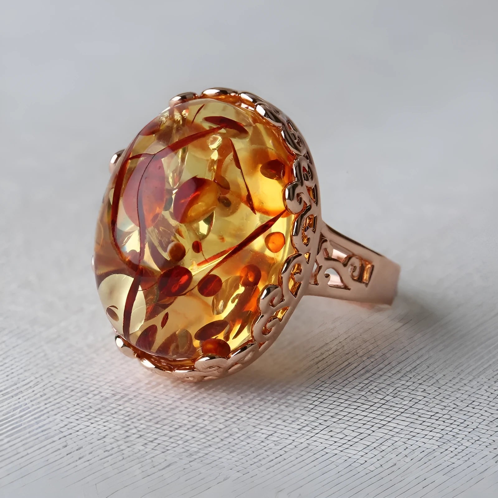 Amber beeswax ring in New Amber Type A colour with retro ethnic design on alloy band