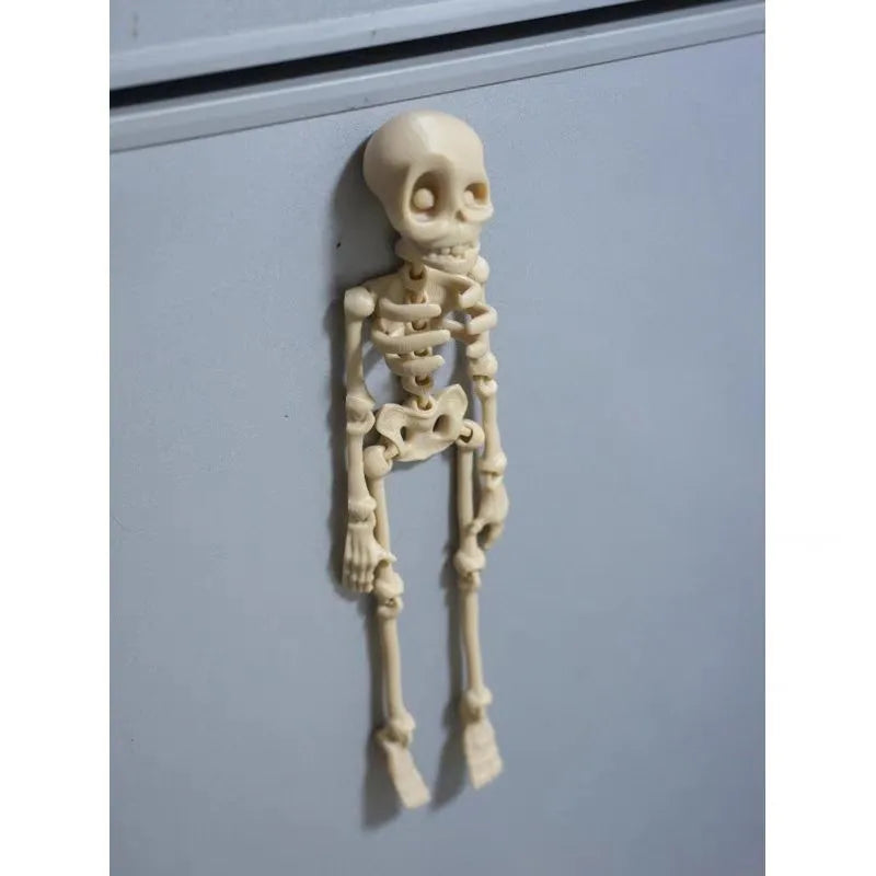 3D printed white skull refrigerator magnet ornament measuring 18cm high