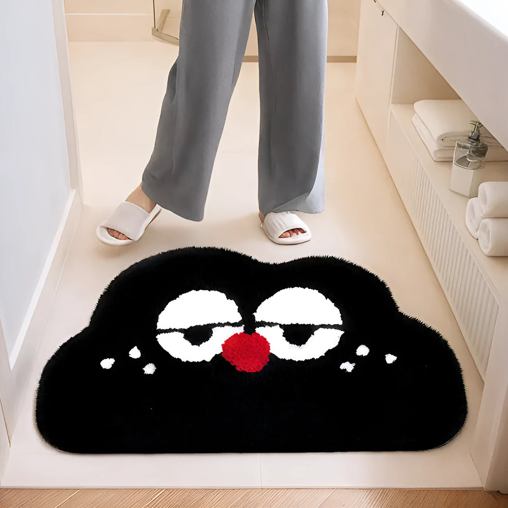 Colourful cartoon anime character design printed on a rectangular polyester bathroom mat.