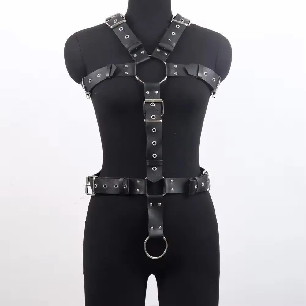 Black patent leather shapewear body suit with a thin adjustable belt and pin buckle fastening.
