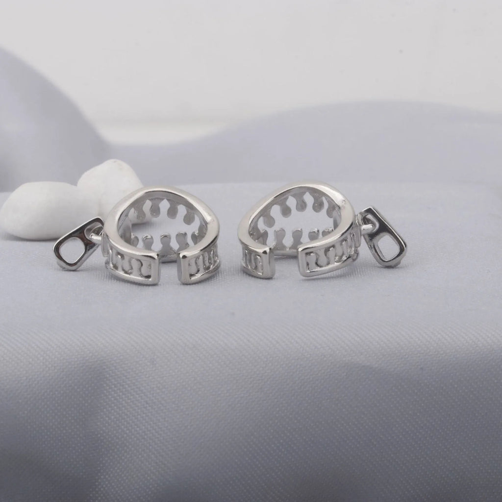 Copper geometric ear clip earrings with linear design and zippered closure mechanism