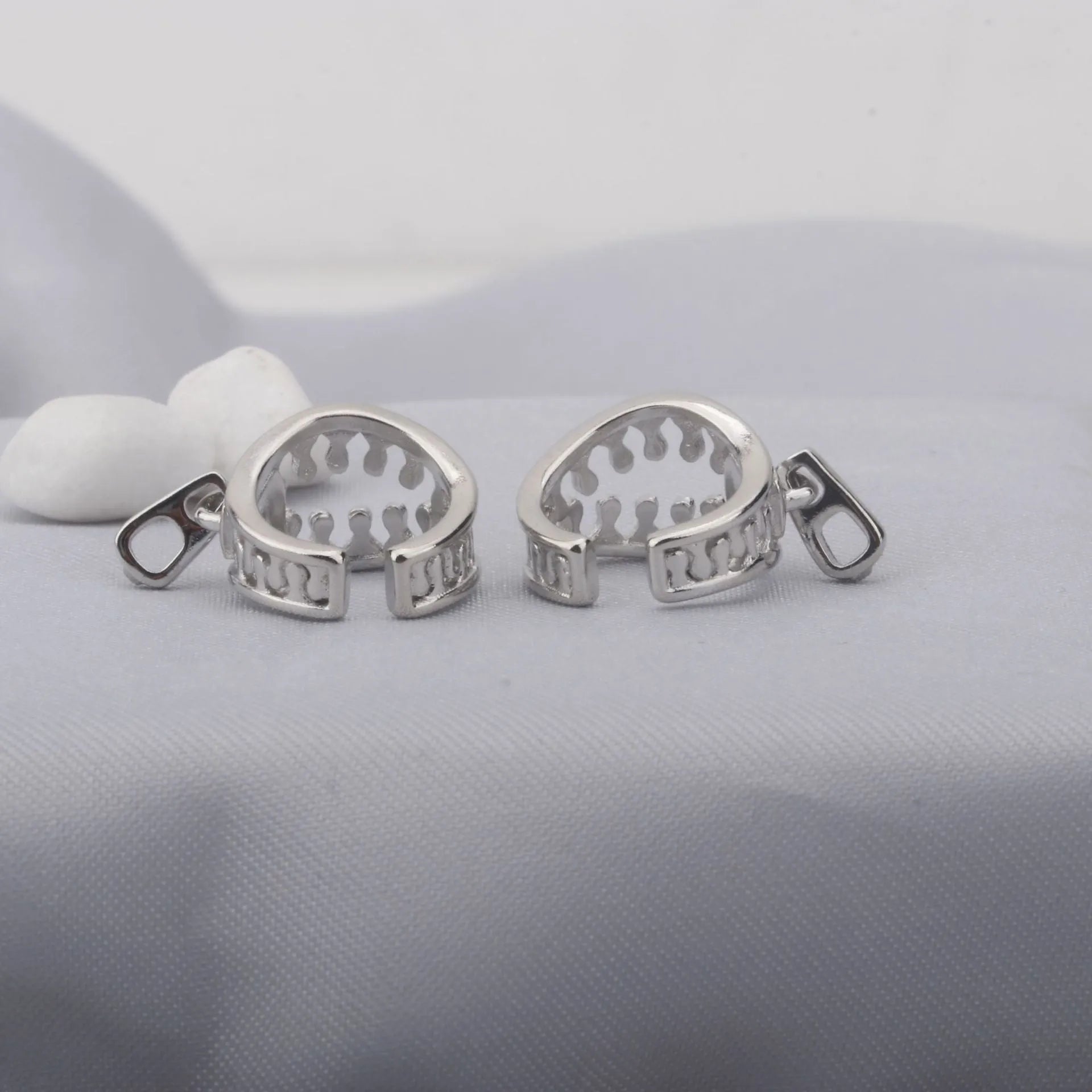 Copper geometric ear clip earrings with linear design and zippered closure mechanism