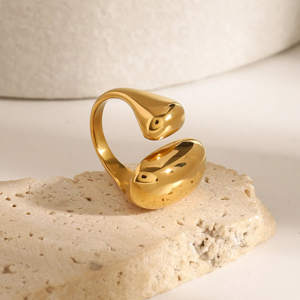Exaggerated geometric open ring for women in stainless steel with a metallic finish.