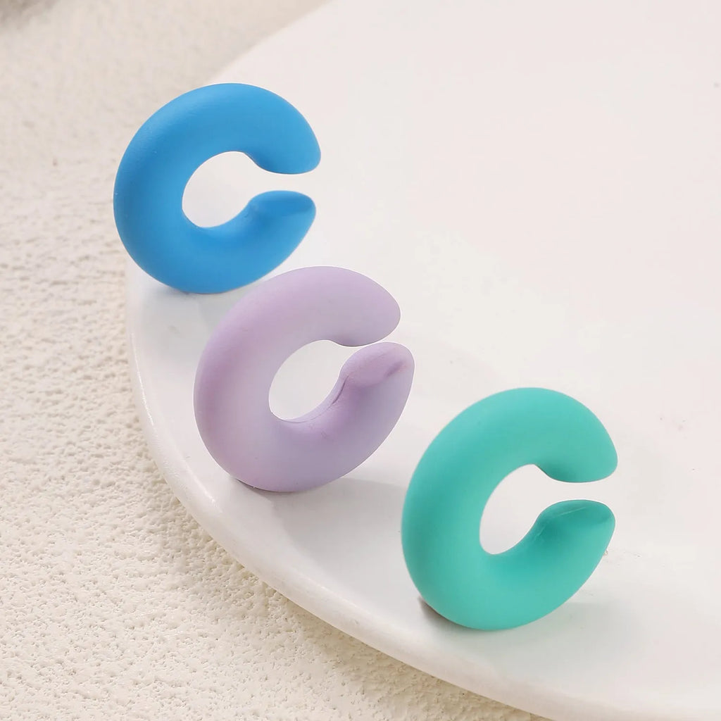 Matte C-shaped CCB non-piercing ear clip in geometric ring style available in multiple candy colours for women