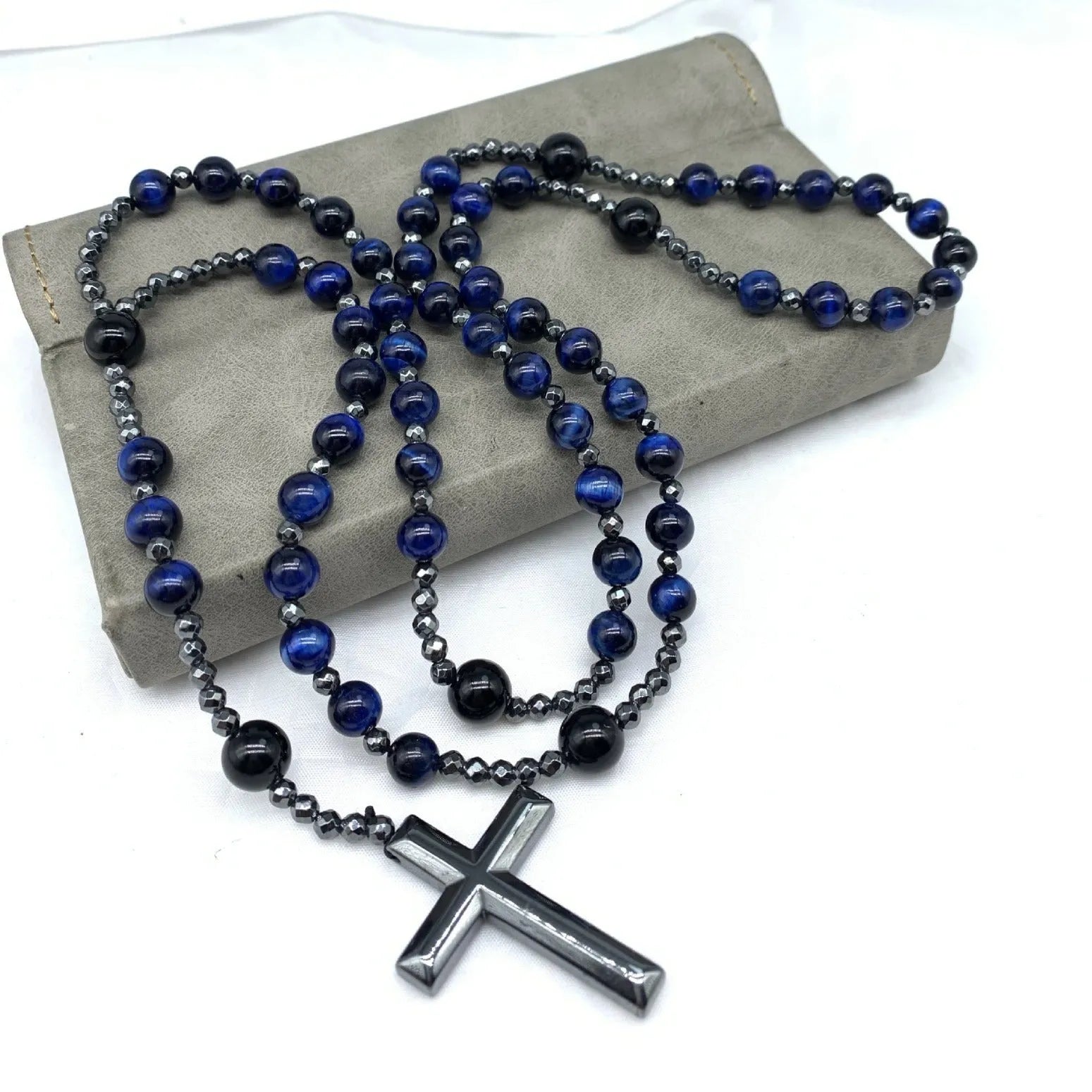 Men's geometric stone cross pendant on a silver ball bead chain with safety lock clasp