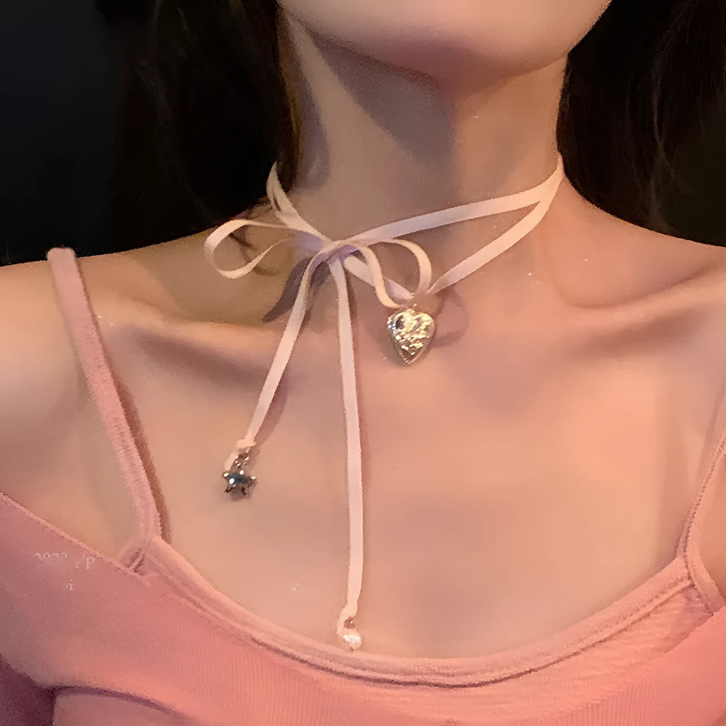 Women's ribbon love pendant fashion necklace on clavicle chain in alloy with electroplated finish