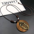 Wooden leaf necklace on wax line chain with adjustable length and ethnic style design