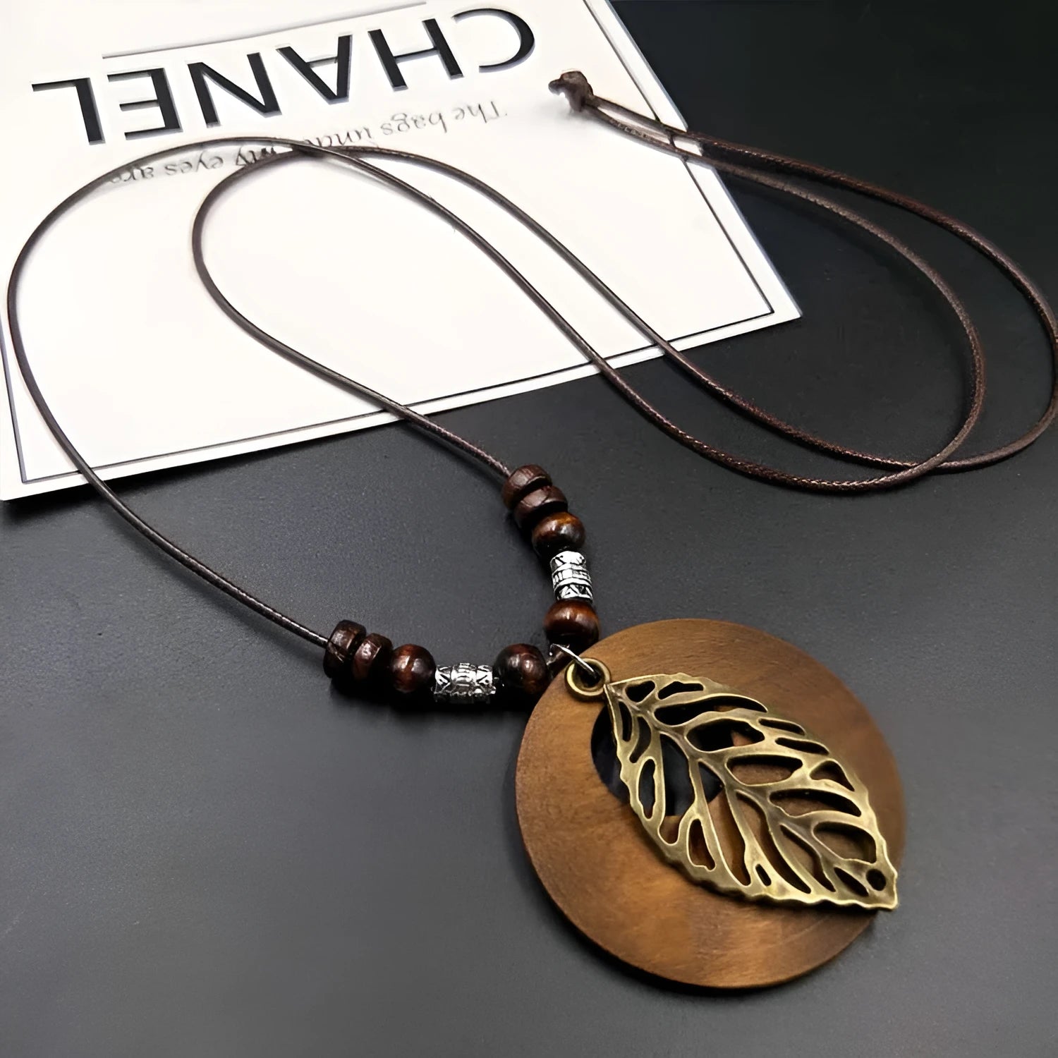 Wooden leaf necklace on wax line chain with adjustable length and ethnic style design