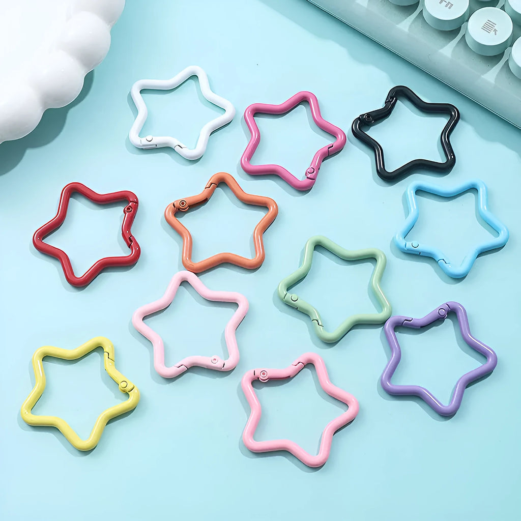Zinc alloy five-pointed star keychain in macaron colours like light pink and green.