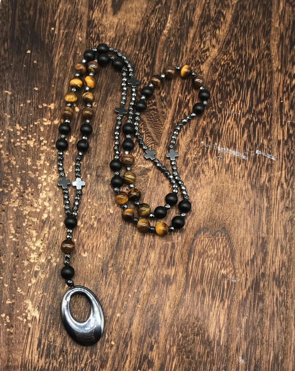 Men's geometric stone cross pendant on a silver ball bead chain with safety lock clasp