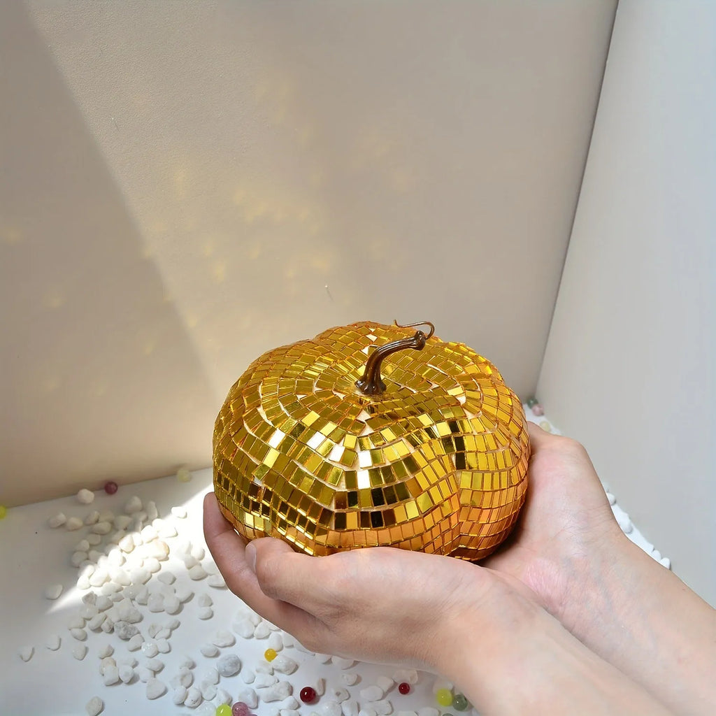 Chinese style glass pumpkin mirror decoration in bionic design for Halloween and home decor.
