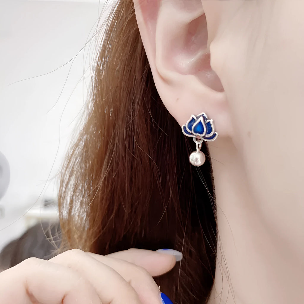 Blue Lotus earrings with lotus flower stud and seedpod tassel in vintage artistic style