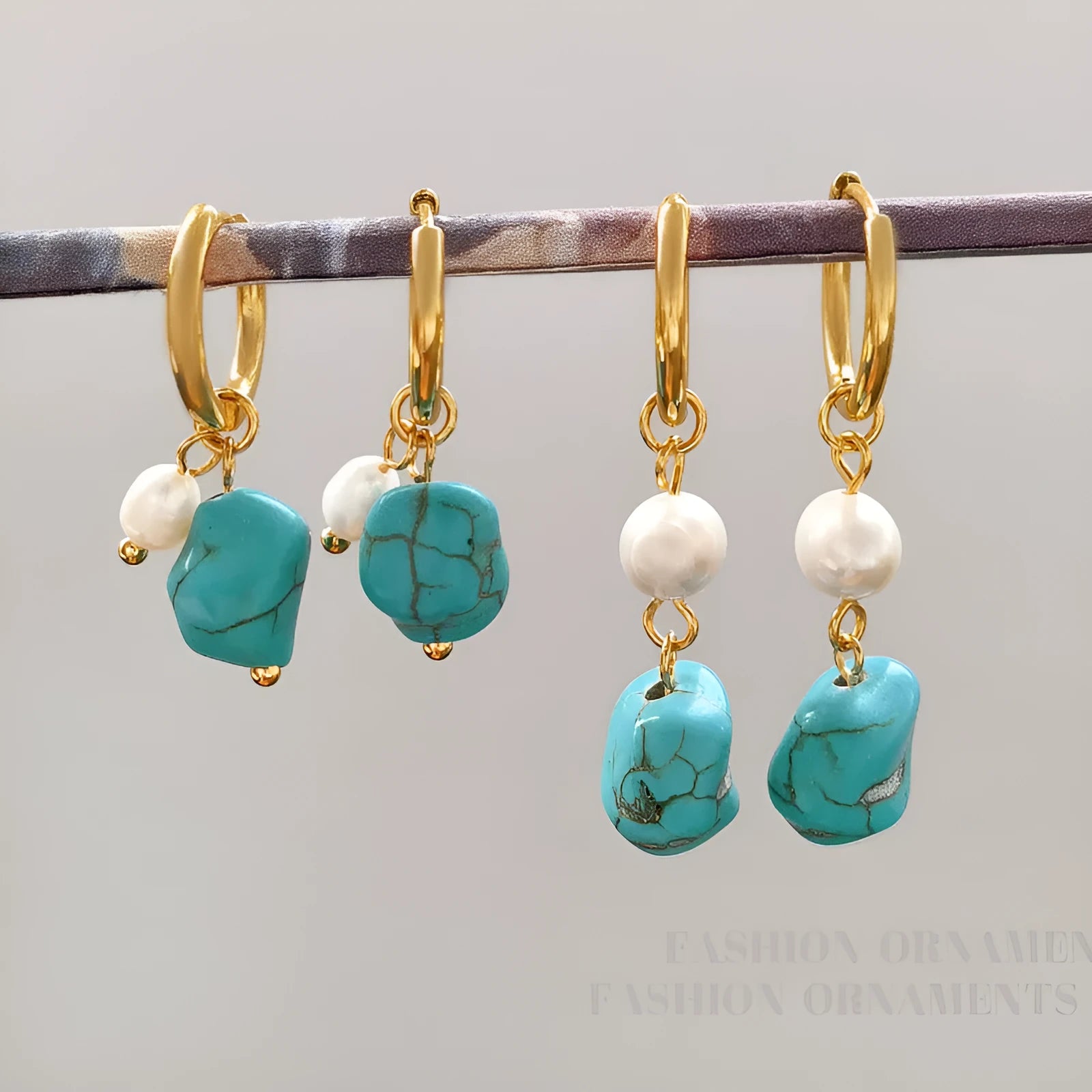 A pair of geometric copper ear clips with irregular turquoise cultured pearls, shown in short and long style options.