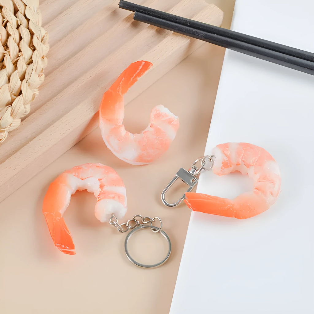 PVC injection moulded shrimp-shaped keychain pendant with door buckle, 1.5cm thick.