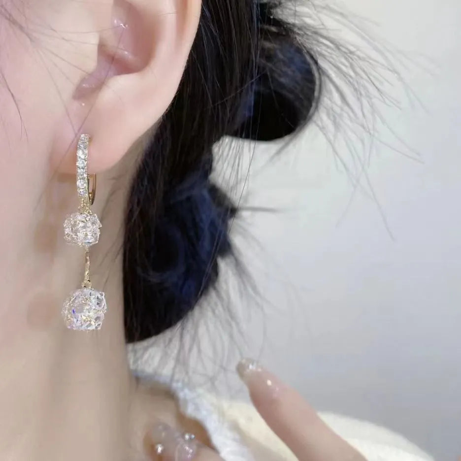 Silver confession balloon tassel ball earrings with rhinestone detailing on copper drop earrings