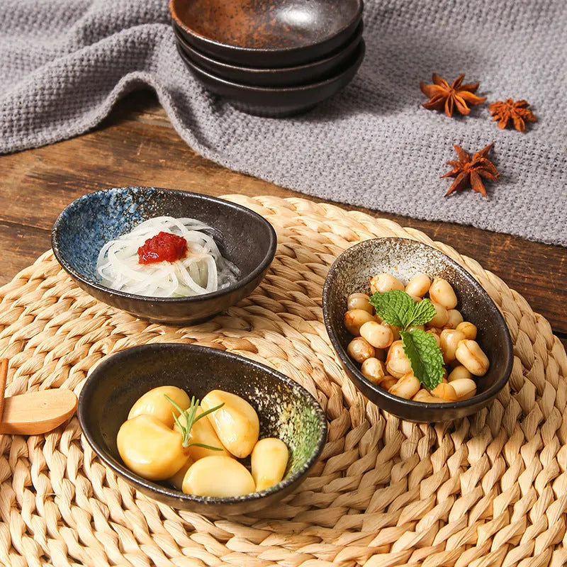 Oval Japanese ceramic dipping bowl with underglaze decorative pattern for sauces