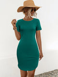 Women's slim fit short sleeve dress with a U-shaped split, in a solid dark green cotton blend fabric.