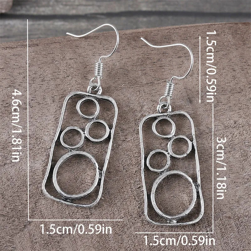 Geometric square earrings with round ring detailing in antique silver colour