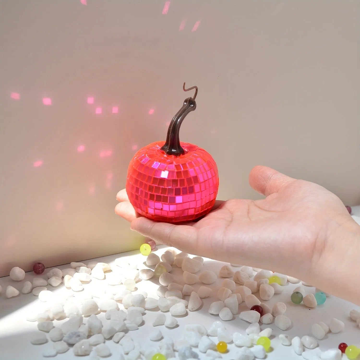 Chinese style glass pumpkin mirror decoration in bionic design for Halloween and home decor.