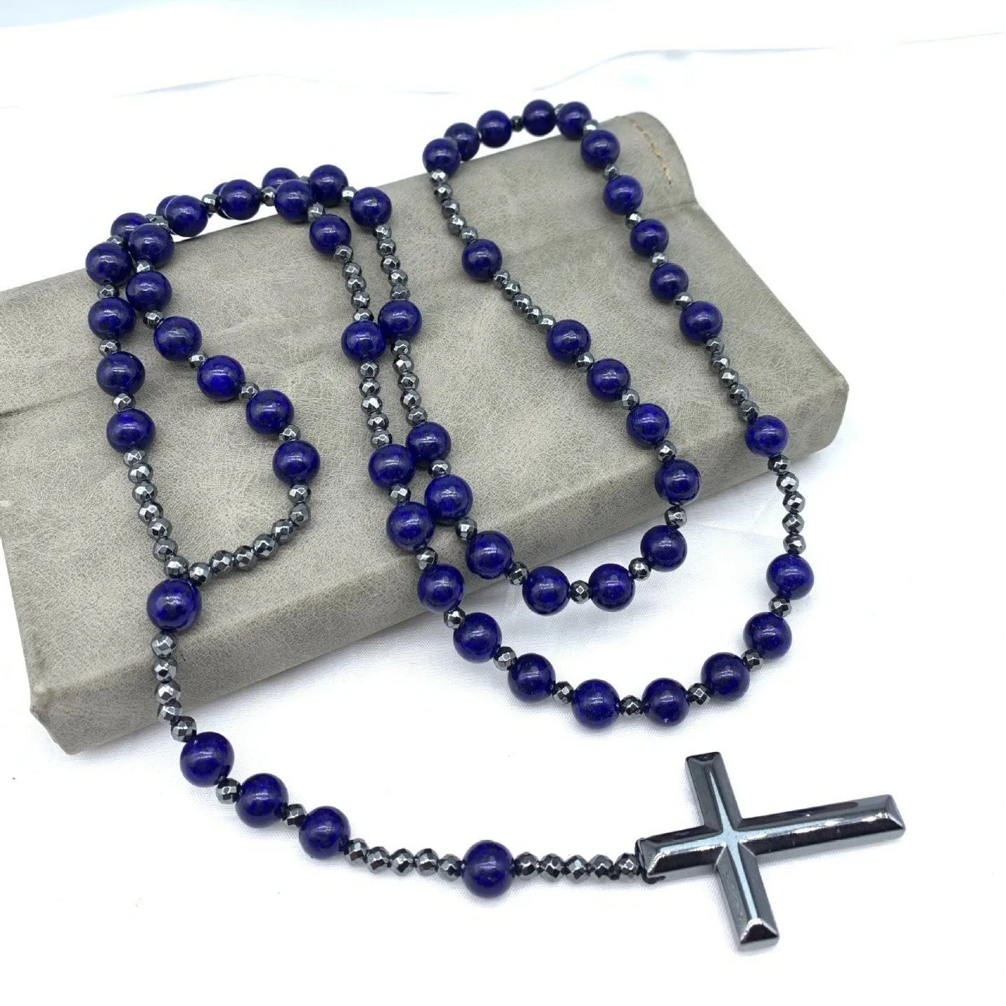 Men's geometric stone cross pendant on a silver ball bead chain with safety lock clasp