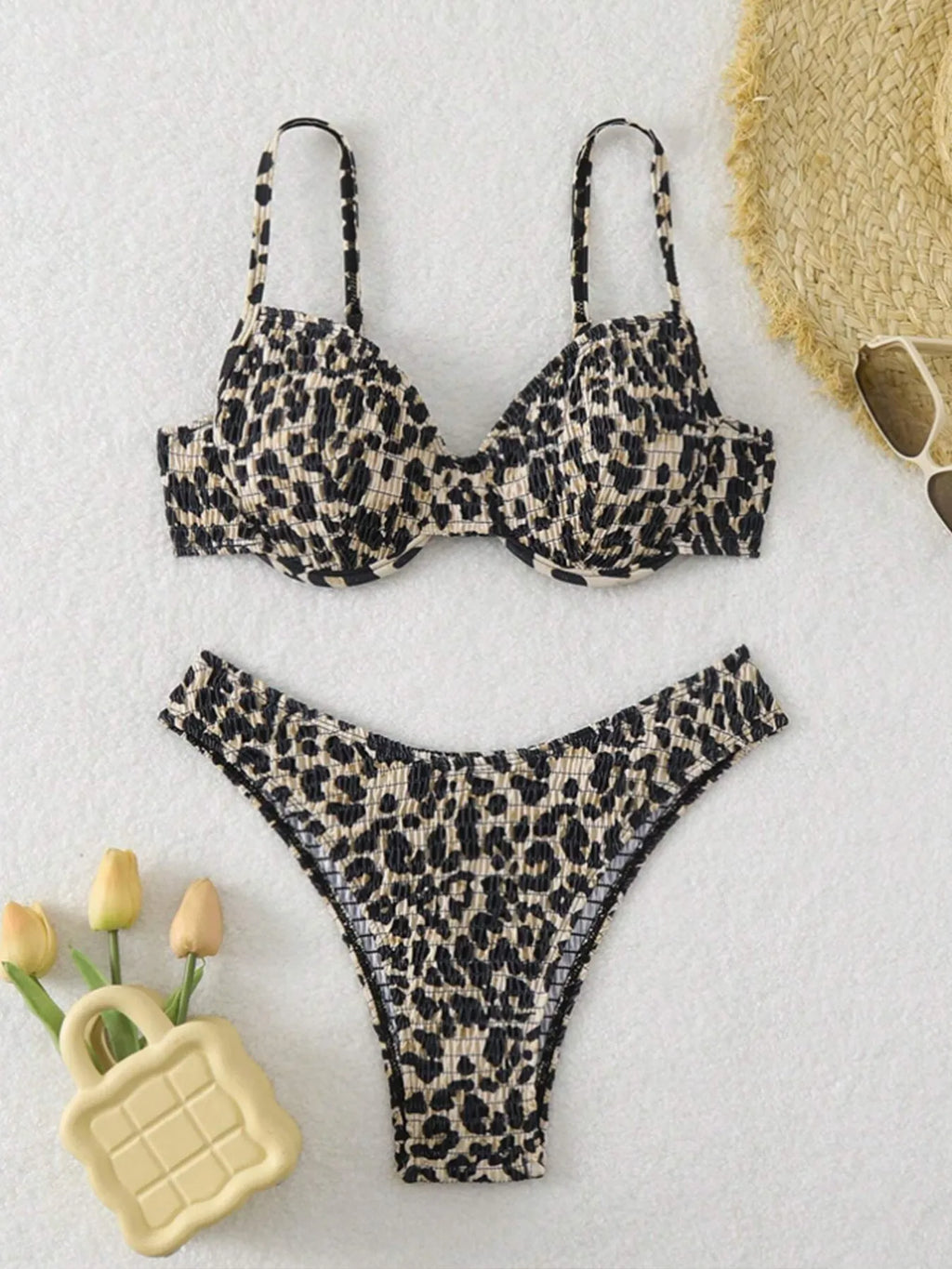 Brown leopard print women's backless bikini swimsuit on a white background
