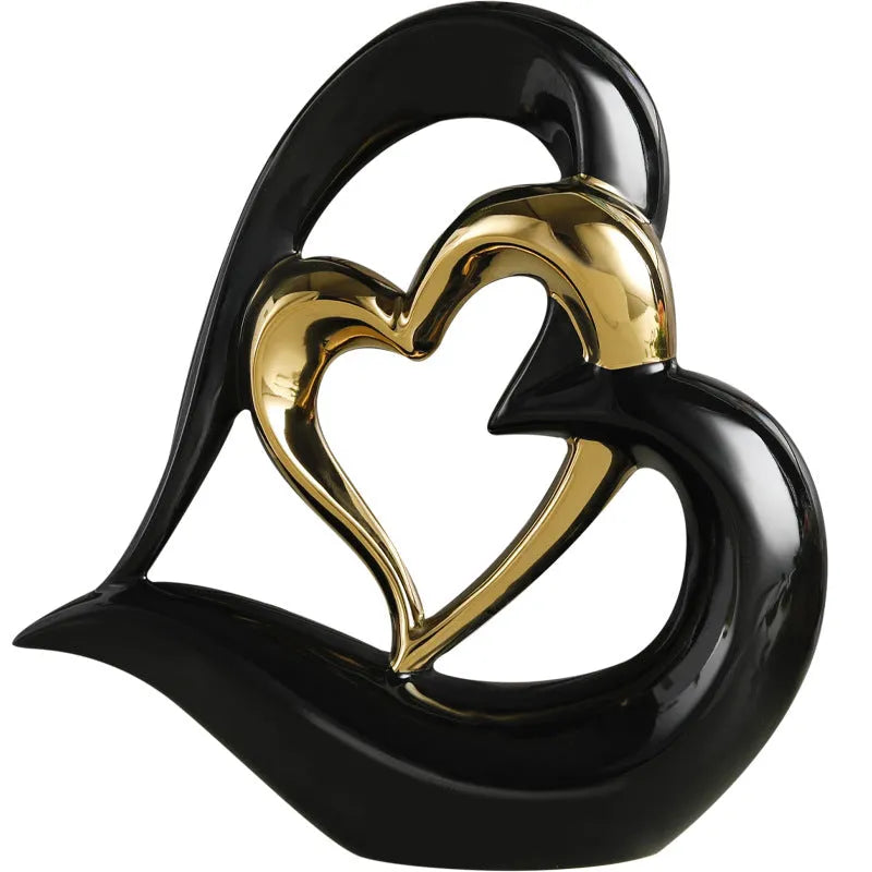 Modern white porcelain Love Heart ornament with a geometric design in a metallic gold finish.