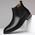 Men's black and light brown pointed toe Chelsea boots with a low heel and artificial PU upper