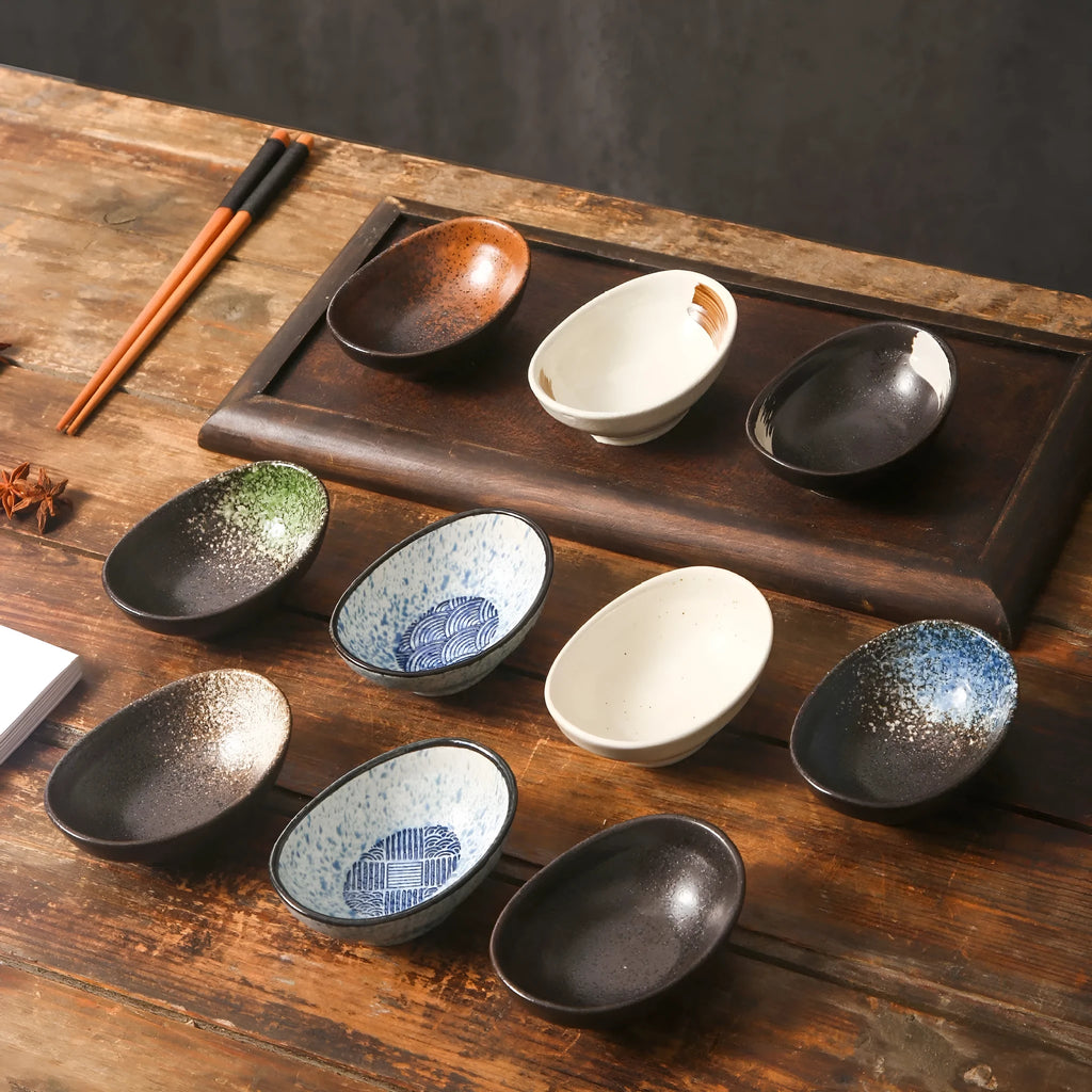 Oval Japanese ceramic dipping bowl with underglaze decorative pattern for sauces
