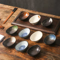 Oval Japanese ceramic dipping bowl with underglaze decorative pattern for sauces