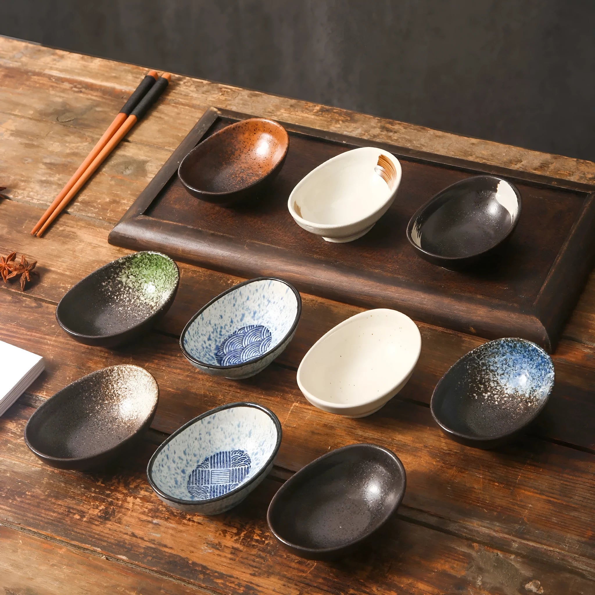 Oval Japanese ceramic dipping bowl with underglaze decorative pattern for sauces